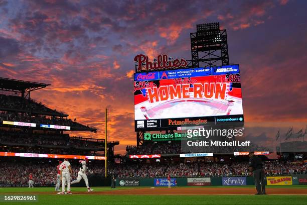 Bryce Harper of the Philadelphia Phillies rounds the bases after hitting a two-run home run in the bottom of the fourth inning against the Los...