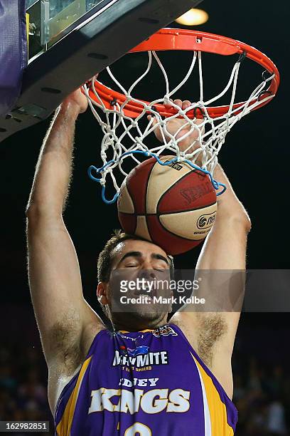 Russell Hinder of the Kings dunks during the round 21 NBL match between the Sydney Kings and the Townsville Crocodiles at Sydney Entertainment Centre...