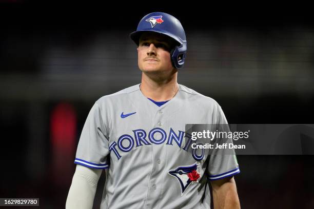 Matt Chapman of the Toronto Blue Jays walks to the dugout during a baseball game against the Cincinnati Reds at Great American Ball Park on August...