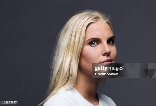 portrait of young woman, studio background - scandinavian woman blond stock pictures, royalty-free photos & images