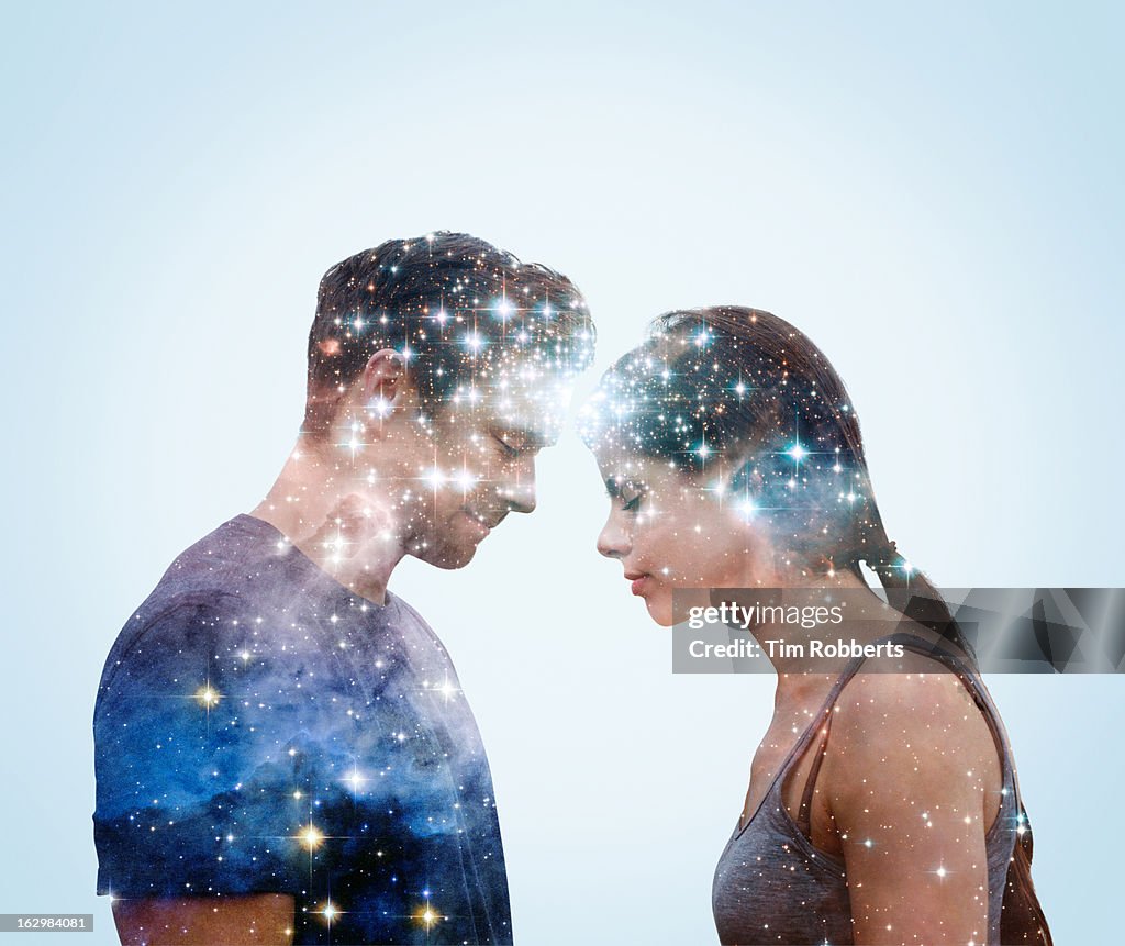 Couple leaning into each other with stars.
