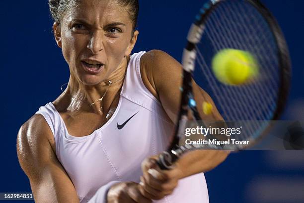 Sara Errani of Italy returns the ball during the final tennis match against Carla Suarez of Spain as part of the Mexican Tennis Open Acapulco 2013 at...