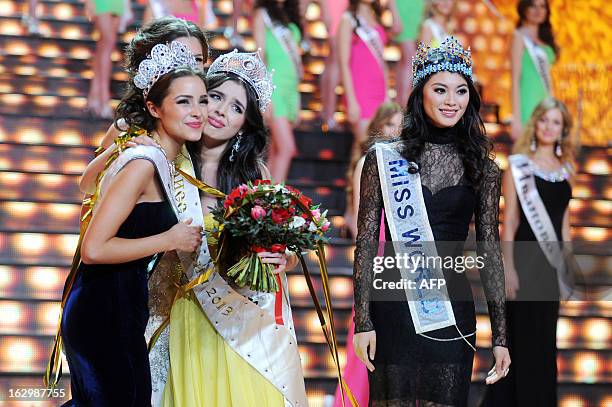 Newly-crowned Miss Russia 2013 Elmira Abdrazakova reacts on stage as current Miss World 2012 Yu Wenxia of China looks on, during the competition in...