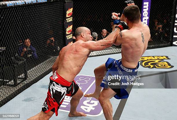 Wanderlei Silva punches Brian Stann in their light heavyweight fight during the UFC on FUEL TV event at Saitama Super Arena on March 3, 2013 in...