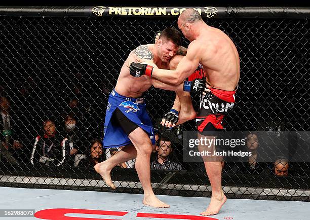 Wanderlei Silva knees Brian Stann in their light heavyweight fight during the UFC on FUEL TV event at Saitama Super Arena on March 3, 2013 in...