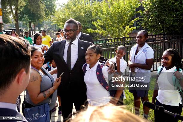 Mayor Brandon Johnson greets students, parents, and staff during the first day of classes at Beidler Elementary School on August 21, 2023 in Chicago,...