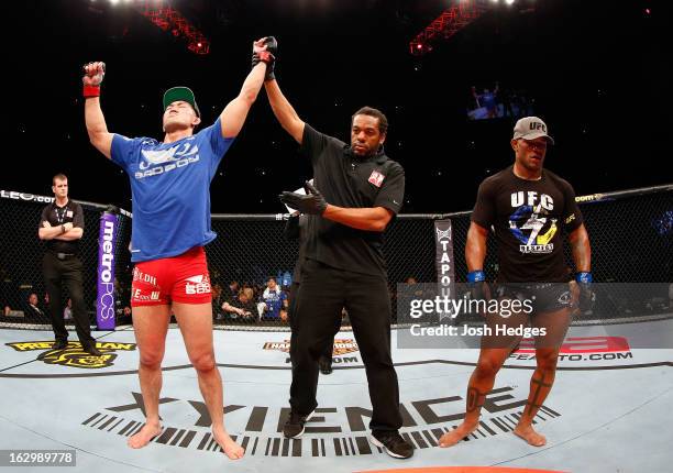 Yushin Okami reacts after defeating Hector Lombard in their middleweight fight during the UFC on FUEL TV event at Saitama Super Arena on March 3,...