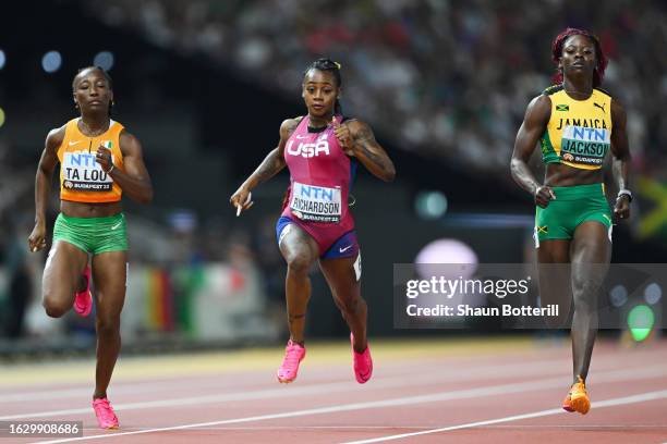 Marie-Josee Ta Lou of Team Ivory Coast, Sha'Carri Richardson of Team United States, and Shericka Jackson of Team Jamaica cross the finish line of the...