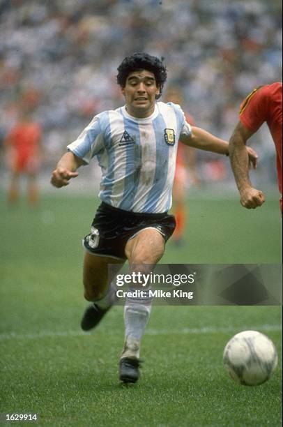 Diego Maradona of Argentina in action during the World Cup semi-final against Belgium at the Azteca Stadium in Mexico City. Argentina won the match...