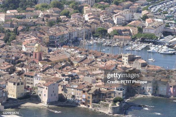 Aerial View Of Saint-Tropez. Vue aérienne de SAINT-TROPEZ avec le quartier de la Ponche, le clocher de l'église et le port.