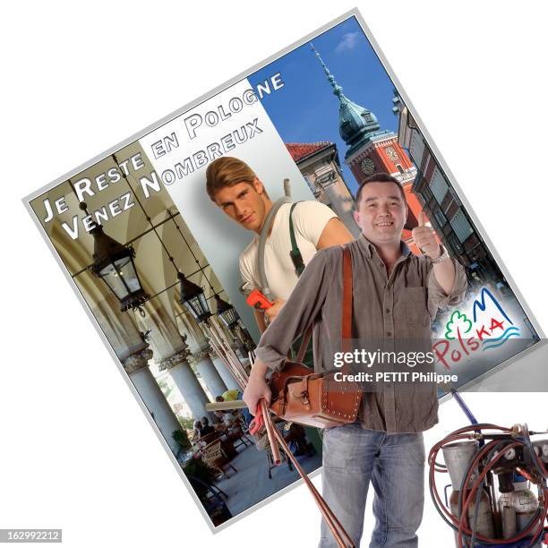 Proud To Be French?. Photo studio : attitude souriante d'Adam STASIK plombier polonais installé en France depuis 1990, le pouce dressé en signe de...