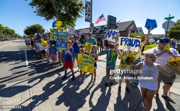 El Segundo, CA Hundreds of El Segundo community members line Main Street with signs and cheers as the El Segundo Little League All Stars arrive home...