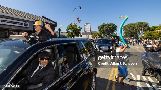 El Segundo, CA El Segundo Little League All Stars player Ollie Parks celebrates through the sun room with a large crowd of El Segundo community...