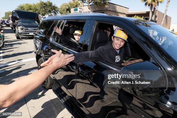 El Segundo, CA Members of the El Segundo Little League team take part in a celebration for their Little League World Series win along Main Street in...