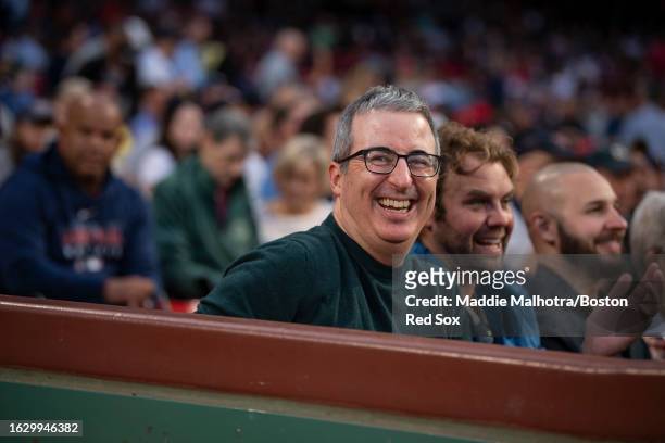Comedian John Oliver reacts before a game between the Houston Astros and the Boston Red Sox on August 28, 2023 at Fenway Park in Boston,...