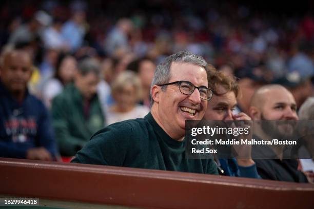 Comedian John Oliver reacts before a game between the Houston Astros and the Boston Red Sox on August 28, 2023 at Fenway Park in Boston,...