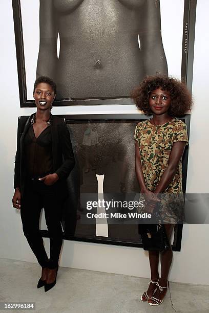 Model Jodie Smith and Oroma Elewa attend the Samuel Bayer Ace Gallery Exhibit Opening, presented by Panavision at Ace Gallery on March 2, 2013 in...