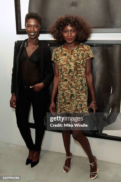 Model Jodie Smith and Oroma Elewa attend the Samuel Bayer Ace Gallery Exhibit Opening, presented by Panavision at Ace Gallery on March 2, 2013 in...