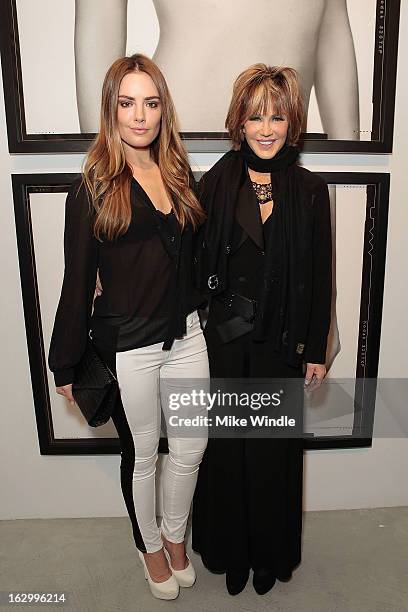 Actresses Beau Dunn and Laura Dunn attend the Samuel Bayer Ace Gallery Exhibit Opening, presented by Panavision at Ace Gallery on March 2, 2013 in...
