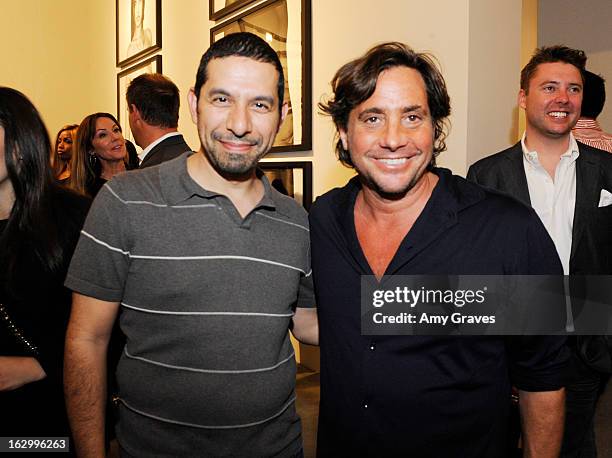 John Leonti and Samuel Bayer attend the Samuel Bayer Ace Gallery Exhibit Opening, presented by Panavision at Ace Gallery on March 2, 2013 in Beverly...