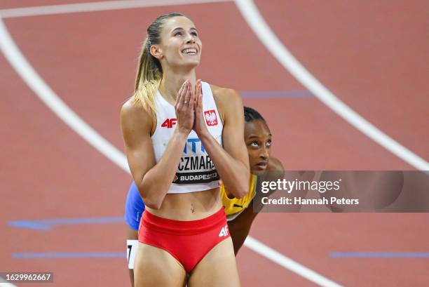 Natalia Kaczmarek of Team Poland reacts after the Women's 400m Semi-Final during day three of the World Athletics Championships Budapest 2023 at...