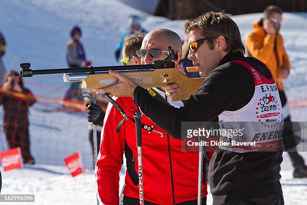 Prince Emmanuel-Philibert of Savoy shoots during the Biatlhon Charity Ski Race To Collect Donations For 'Star Team For The Children MC' on March 2,...