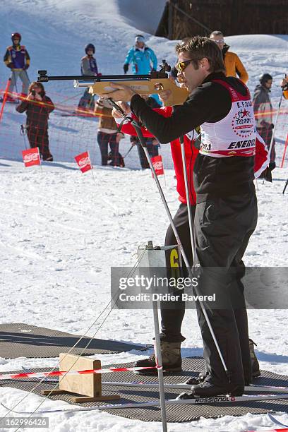 Prince Emmanuel-Philibert of Savoy shoots during the Biatlhon Charity Ski Race To Collect Donations For 'Star Team For The Children MC' on March 2,...