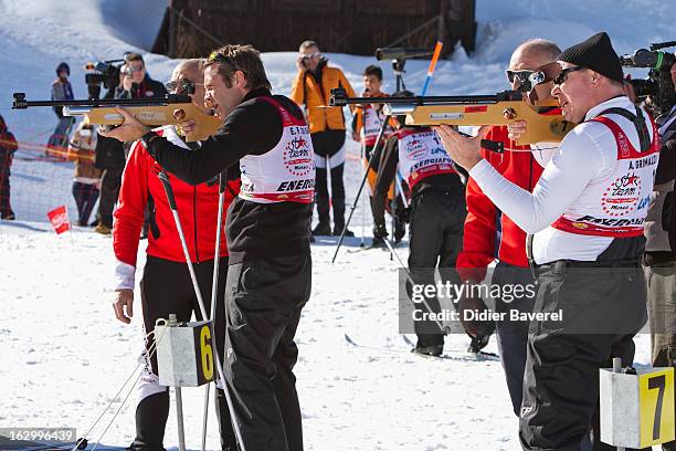 Prince Albert II of Monaco and Prince Emmanuel-Philibert of Savoy shoot during the Biatlhon Charity Ski Race To Collect Donations For 'Star Team For...