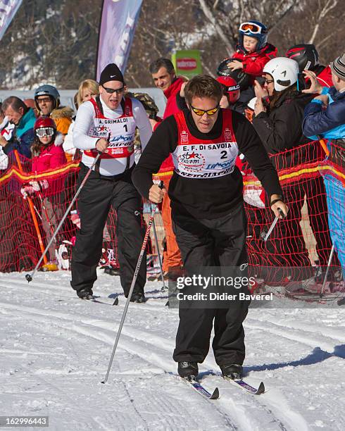 Prince Albert II of Monaco and Prince Emmanuel-Philibert of Savoy race during the Biatlhon Charity Ski Race To Collect Donations For 'Star Team For...