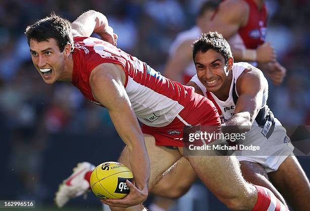 Dean Towers of the Sydney Swans handpasses the ball during the round two AFL NAB Cup match between the St Kilda Saints and the Sydney Swans at Etihad...