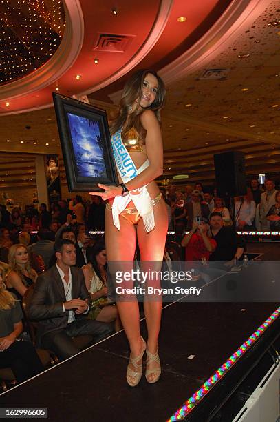 Maria de Luz Da Silva of Venezuela competes in the third annual TropicBeauty World Finals at the MGM Grand Hotel/Casino on March 2, 2013 in Las...