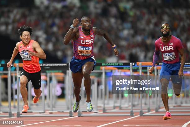Shunsuke Izumiya of Team Japan, Grant Holloway of Team United States and Freddie Crittenden of Team United States compete in the Men's 110m Hurdles...