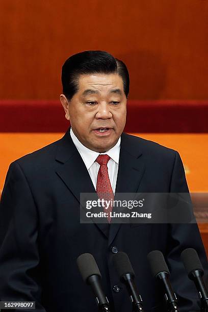 Jia Qinglin, Chairman of the National Committee of the Chinese People's Political Consultative Conference delivers a speech at the opening session of...