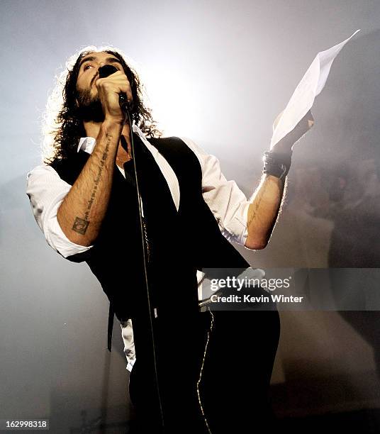 Comedian Russell Brand introduces singer Morrissey at Hollywood High School on March 2, 2013 in Los Angeles, California.