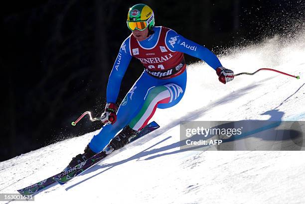 Italy's Siegmar Klotz competes during the men's Super-G race at the FIS Ski World Cup on March 3, 2013 in Kvitfjell, Norway. Norway's Aksel Lund...