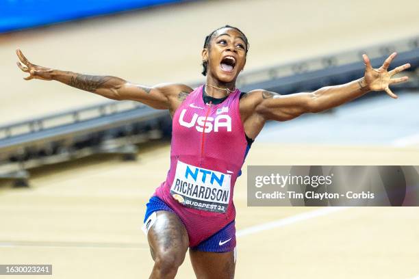 August 21: Sha'Carri Richardson of the United States celebrates as she crosses the line in lane nine to win the Women's 100m Final during the World...