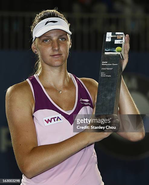 Karolina Pliskova of Czech Republic poses with her trophy after winning the Singles Final match against Bethanie Mattek-Sands of USA during the 2013...