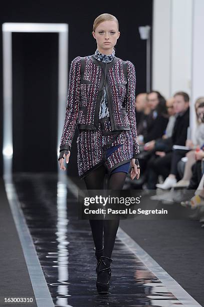 Model walks the run way during the Maxime Simoens Fall/Winter 2013 Ready-to-Wear show as part of Paris Fashion Week on March 3, 2013 in Paris, France.