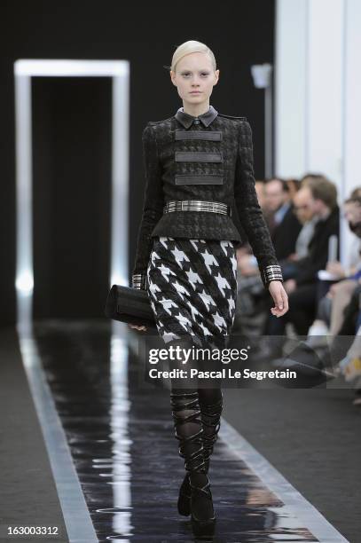 Model walks the run way during the Maxime Simoens Fall/Winter 2013 Ready-to-Wear show as part of Paris Fashion Week on March 3, 2013 in Paris, France.