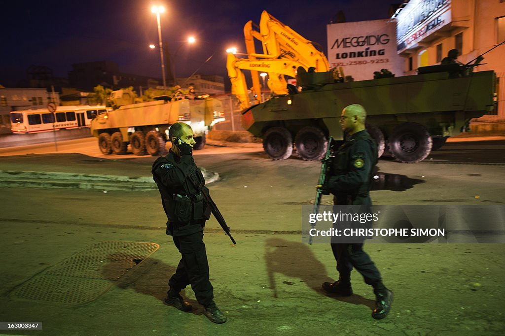 Bope Police Rio Brazilian BOPE police elite unit supported by APCs patrol during an ...