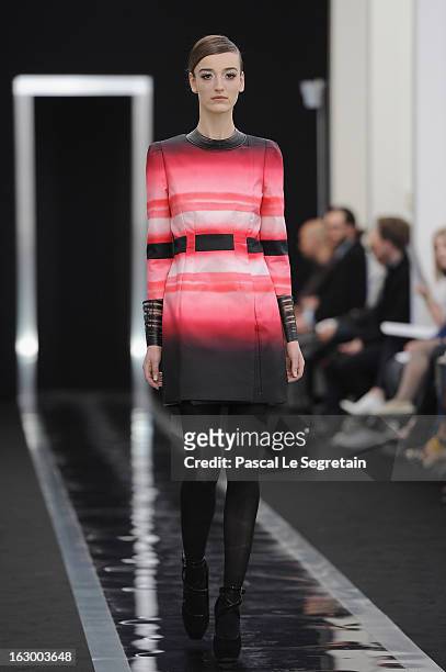 Model walks the run way during the Maxime Simoens Fall/Winter 2013 Ready-to-Wear show as part of Paris Fashion Week on March 3, 2013 in Paris, France.