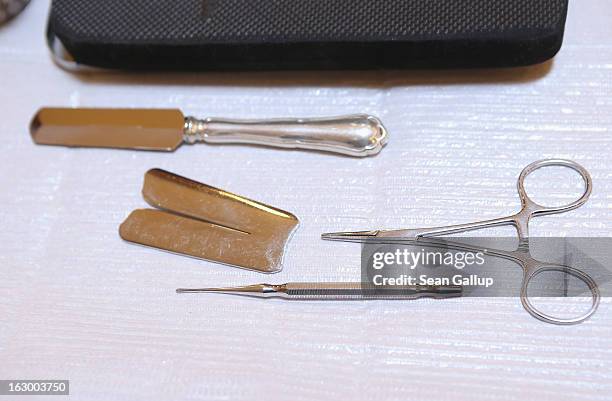 Instruments used in the Jewish circumcision ceremony lie on a table prior to the circumcision of baby infant Mendl Teichtal at the Chabad Lubawitsch...