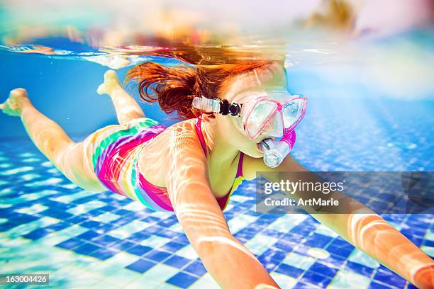 snorkeling underwater - scuba diving girl stock pictures, royalty-free photos & images