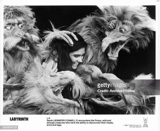 Jennifer Connelly is encountered by Fireys in a scene from the film 'Labyrinth', 1986.