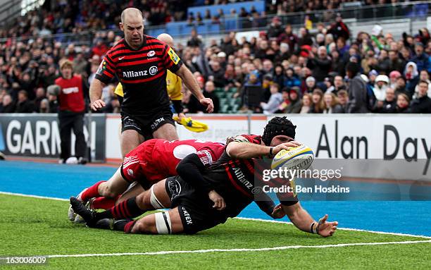 Will Fraser of Saracens scores a try during the Aviva Premiership match between Saracens and London Welsh at Allianz Park on March 03, 2013 in...