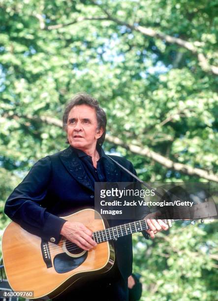 American country musician Johnny Cash performs with the Highwaymen at Central Park SummerStage, New York, New York, May 23, 1993.