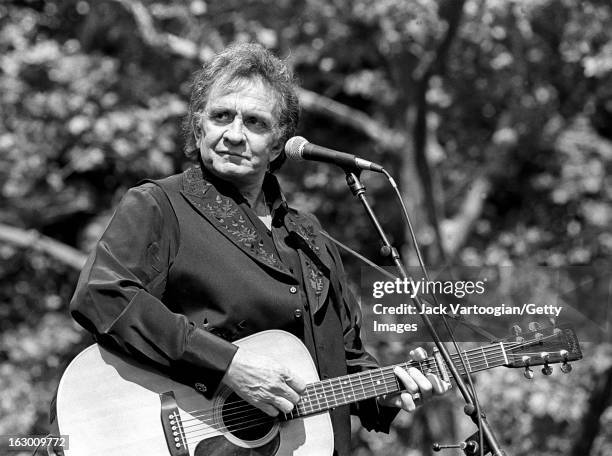 American country musician Johnny Cash performs with the Highwaymen at Central Park SummerStage, New York, New York, May 23, 1993.
