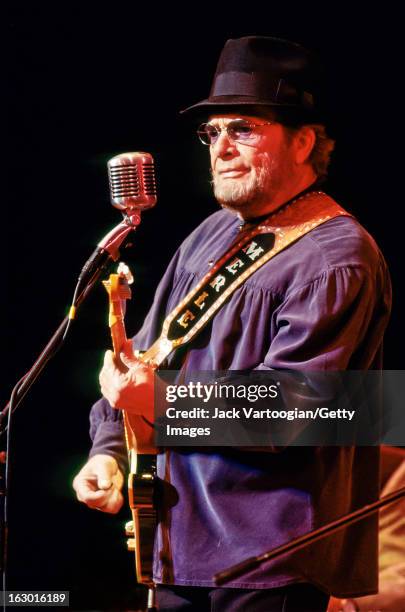 American country musician Merle Haggard leads his band the Strangers during a performance at Town Hall, New York, New York, October 25, 1999.