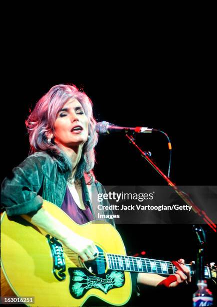 American country musician Emmylou Harris leads her band Spyboy at the Roots of American Music Festival, Damrosch Park Bandshell, Lincoln Center...