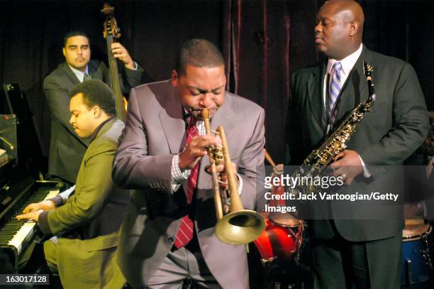American jazz musician Wynton Marsalis, on trumpet, leads his band at a benefit for the House of Tribes in the East Village neighborhood of Alphabet...